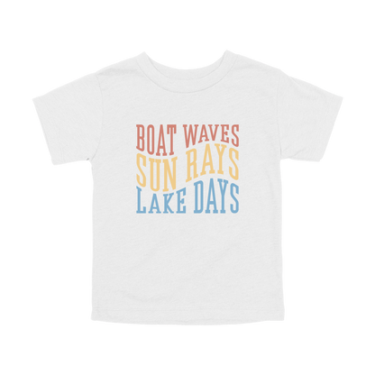 Boat Waves, Sun Rays, Lake Days design on a White toddler T-shirt, front view.