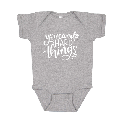 You Can Do Hard Things design on a Heather Athletic Gray infant onesie, front view.