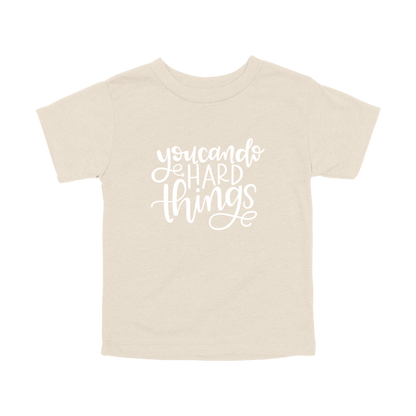 You Can Do Hard Things design on a Natural toddler T-shirt, front view.