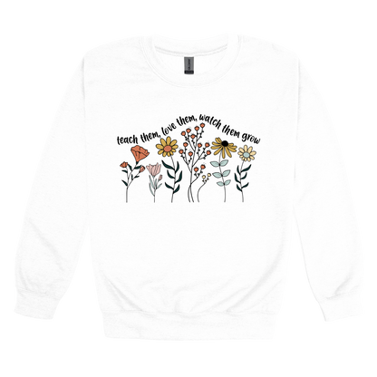 Teach Them, Love Them, Let Them Grow design on a White adult crewneck sweatshirt, front view.