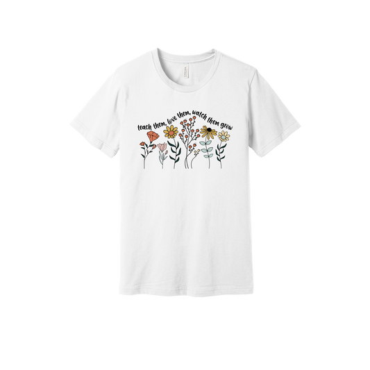 Teach Them, Love Them, Let Them Grow design on a White adult T-shirt, front view.