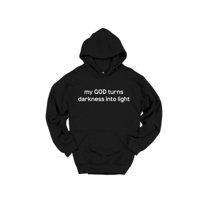 My God Turns Darkness into Light Apparel — black adult-hoodie front