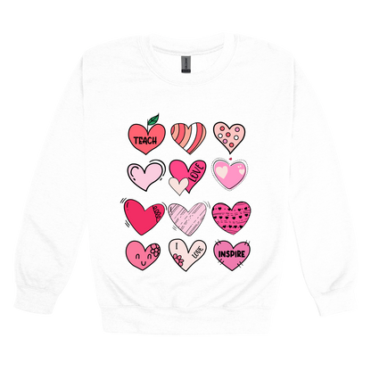 Teach Love Inspire Hearts teacher design on White adult Crewneck, front view.
