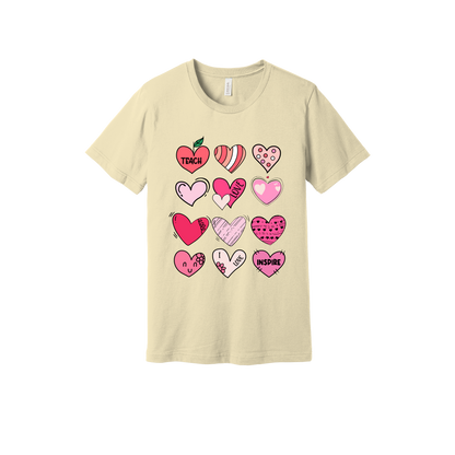 Teach Love Inspire Hearts teacher design on Natural adult T-Shirt, front view.