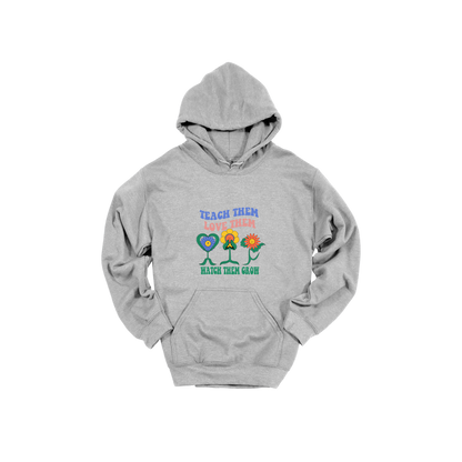 Teach Them Love Them teacher design on Sport Gray adult Hoodie, front view.