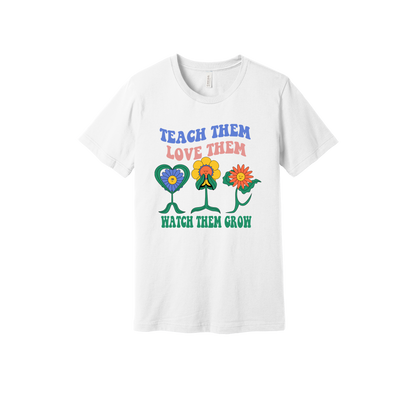 Teach Them Love Them teacher design on White adult T-Shirt, front view.
