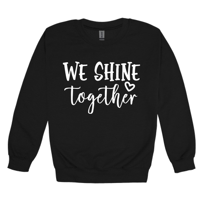 We Shine Together design on Black adult Crewneck, front view.