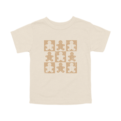 Gingerbread Holiday Apparel design on toddler tee in tan, front view.