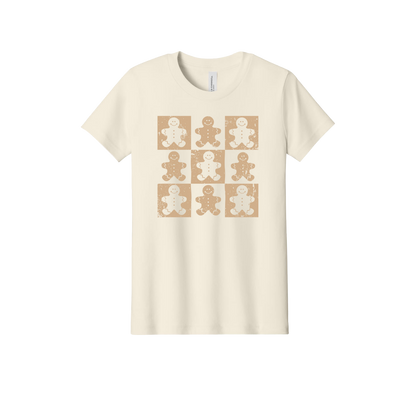 Gingerbread Apparel design on official Youth Bella+Canvas T-shirt in Natural, front view.