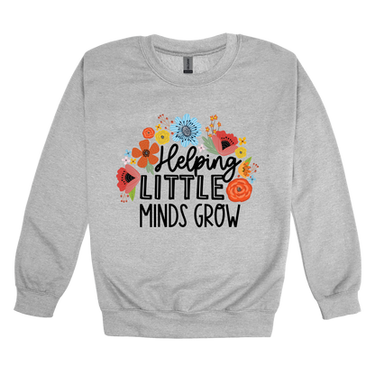 Helping Little Minds Grow Apparel design on adult crewneck in gray, front view.