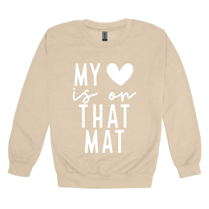 My Heart Is on That Mat Apparel design on adult crewneck in tan, front view.