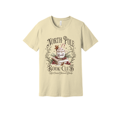 North Pole Book Club Apparel design on adult tee in tan, front view.