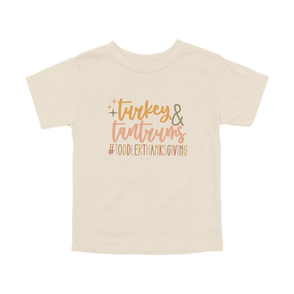 Turkey and Tantrums Apparel design on toddler tee in tan, front view.