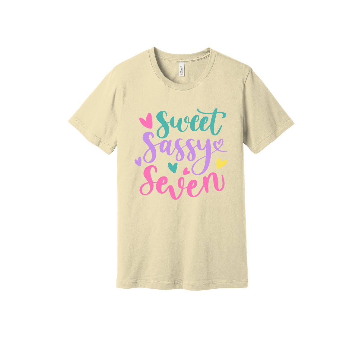 Sweet and Sassy Seven Apparel design on generic tee presentation in tan, front view.