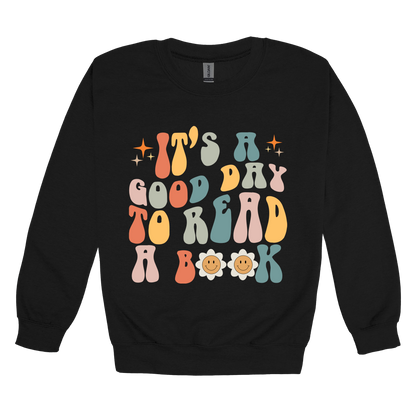 It's a Good Day to Read a Book Apparel design on adult crewneck in black, front view.