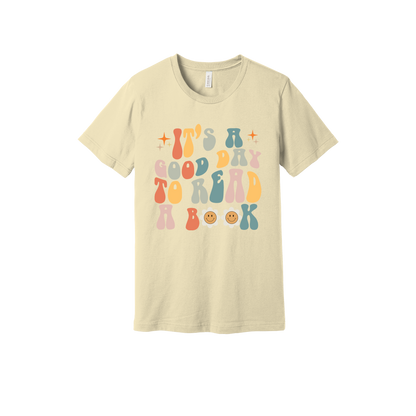 It's a Good Day to Read a Book Apparel design on adult tee in tan, front view.