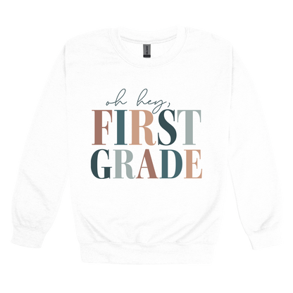 Oh Hey First Grade design shown on White adult Gildan crewneck sweatshirt.