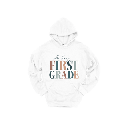 Oh Hey First Grade design shown on White adult Gildan hoodie.