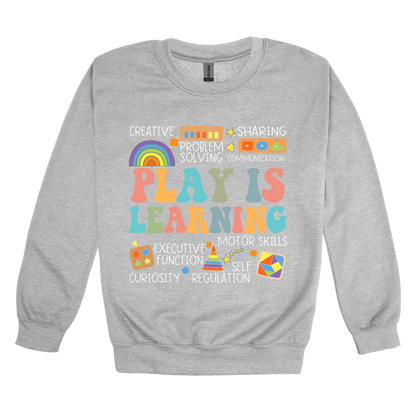 Play Is Learning design shown on Sport Gray adult Gildan crewneck sweatshirt.